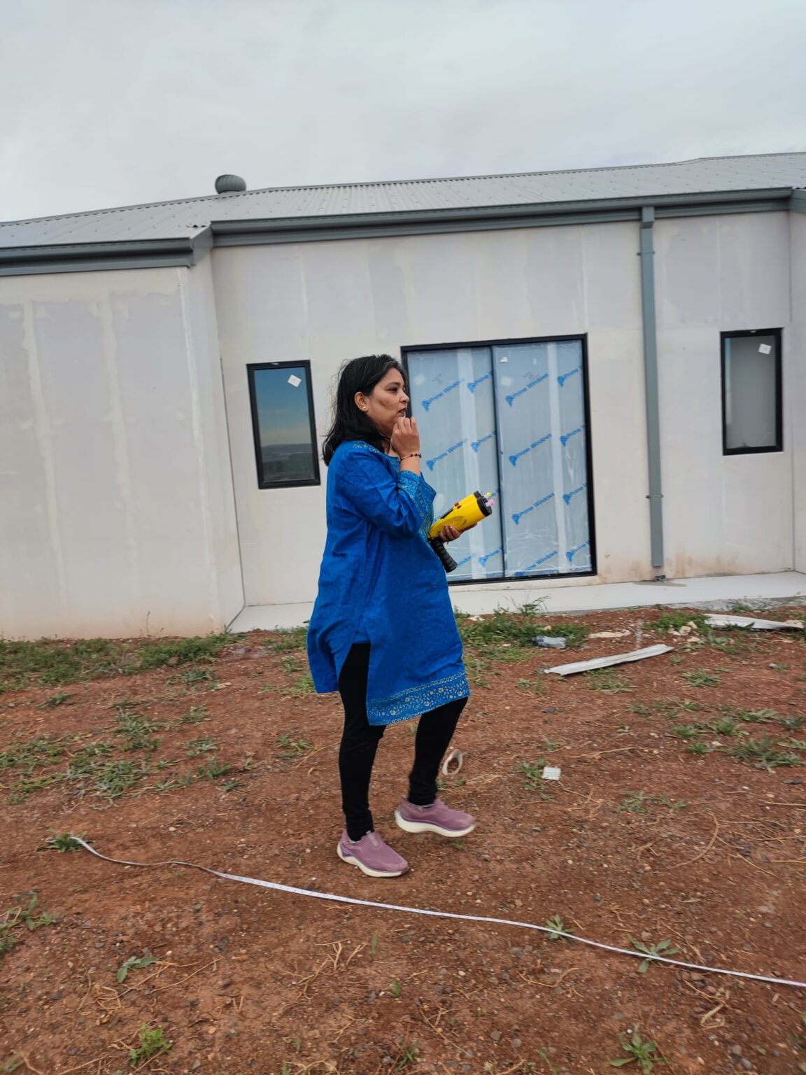 Vastu Site Expert doing client site consultation by Renuka Singh Jain